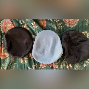 3 “Skully cap” style hats 2 black 1 blue. All are “one size”